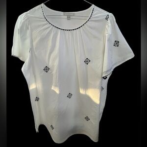 Woman Within White Blouse with Black Embroidery